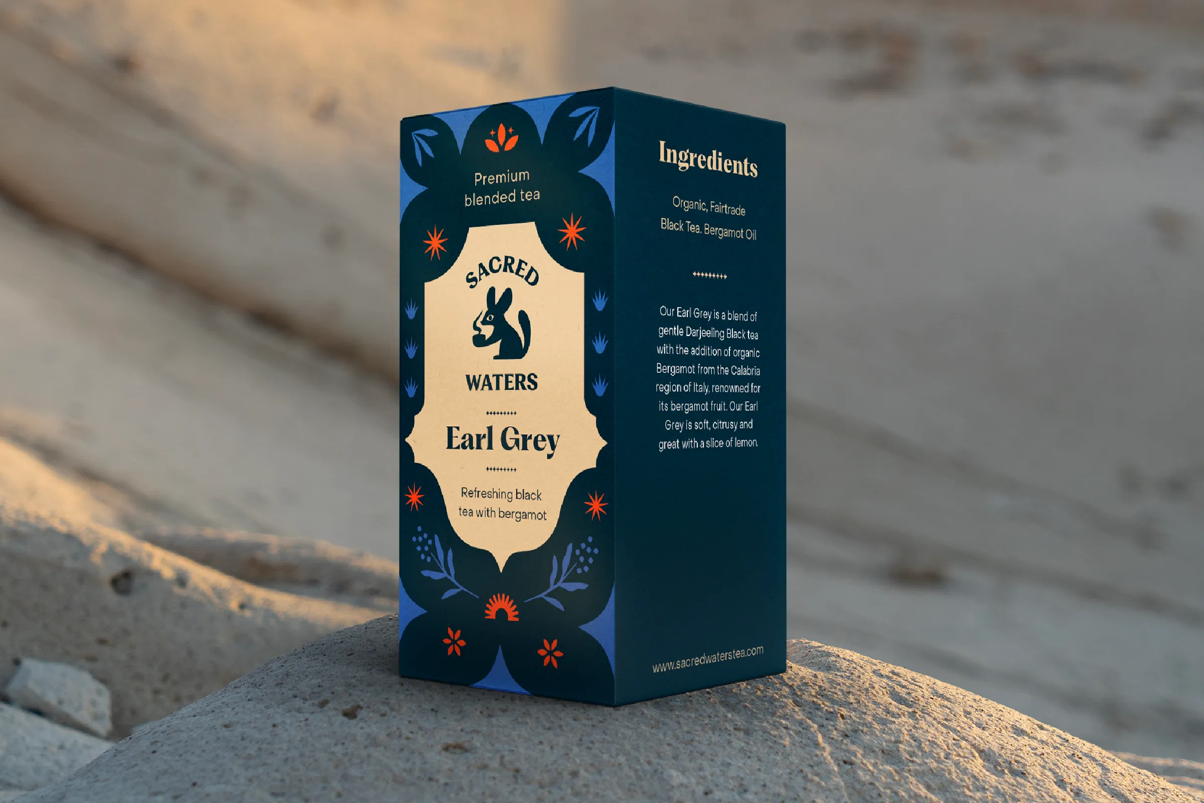 Earl Grey box standing on a rock in warm evening light